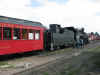 The locomotive in front of our red parlor car