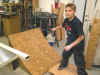 Nathan trying out his new skateboard ramp with Jim's homemade skateboard