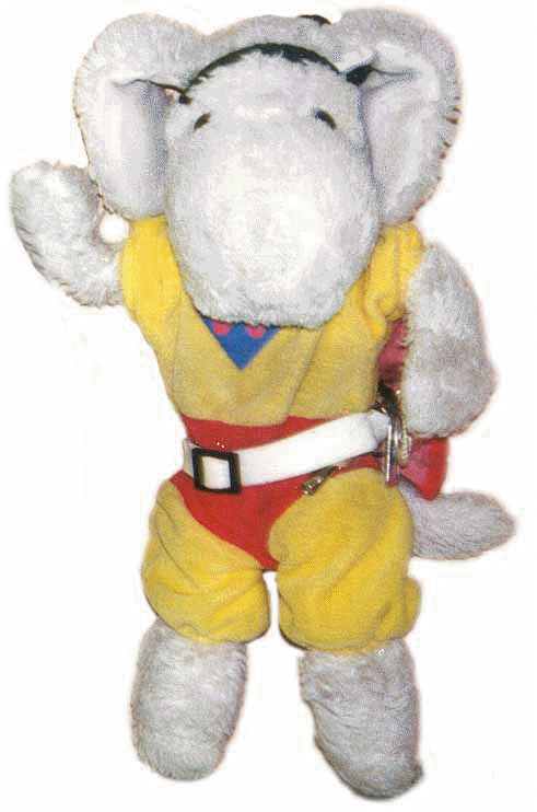 Sparky standing, showing off his cool super hero outfit.